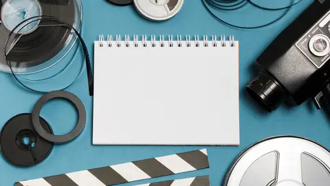 flat-lay-notebook-cinema-equipment