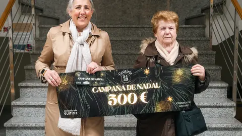 FOTO GUITIRIZ - O Concello de Guitiriz fai entrega do vale de 500 euros da campa&ntilde;a de Nadal do Comercio