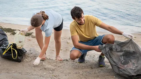 people-cleaning-garbage-from-nature